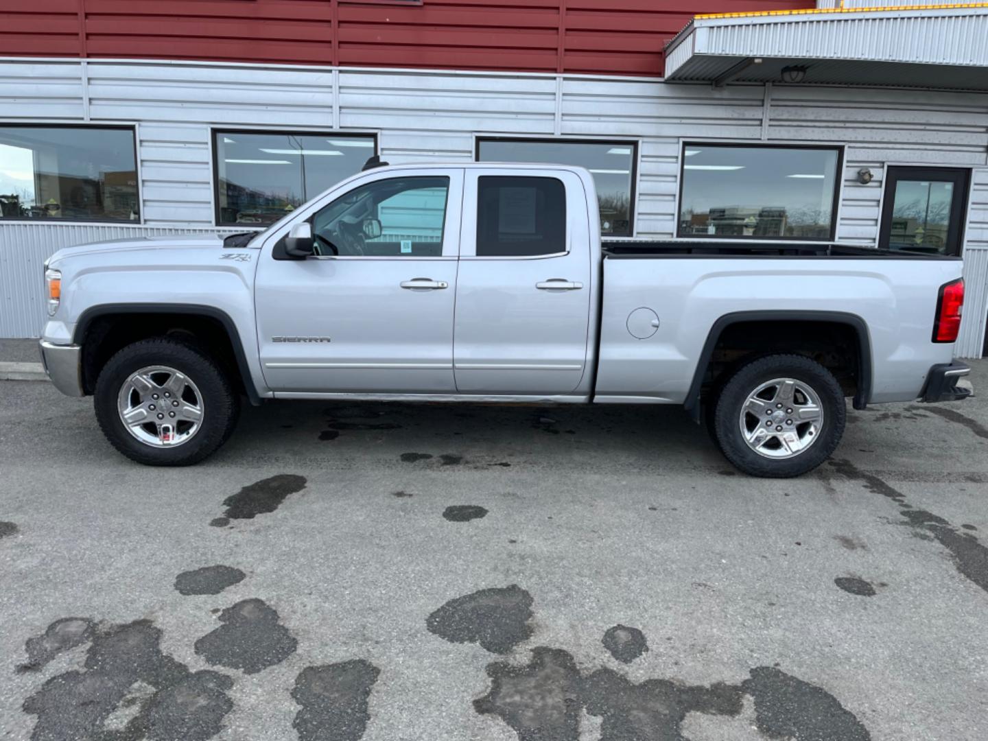 2015 Silver /charcoal cloth GMC Sierra 1500 SLE Double Cab 4WD (1GTV2UEC7FZ) with an 5.3L V8 OHV 16V engine, 6-Speed Automatic transmission, located at 1960 Industrial Drive, Wasilla, 99654, (907) 274-2277, 61.573475, -149.400146 - Photo#1